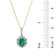 7X5MM Oval Emerald and Diamond Halo Pendant in 10KT Yellow Gold For Discount